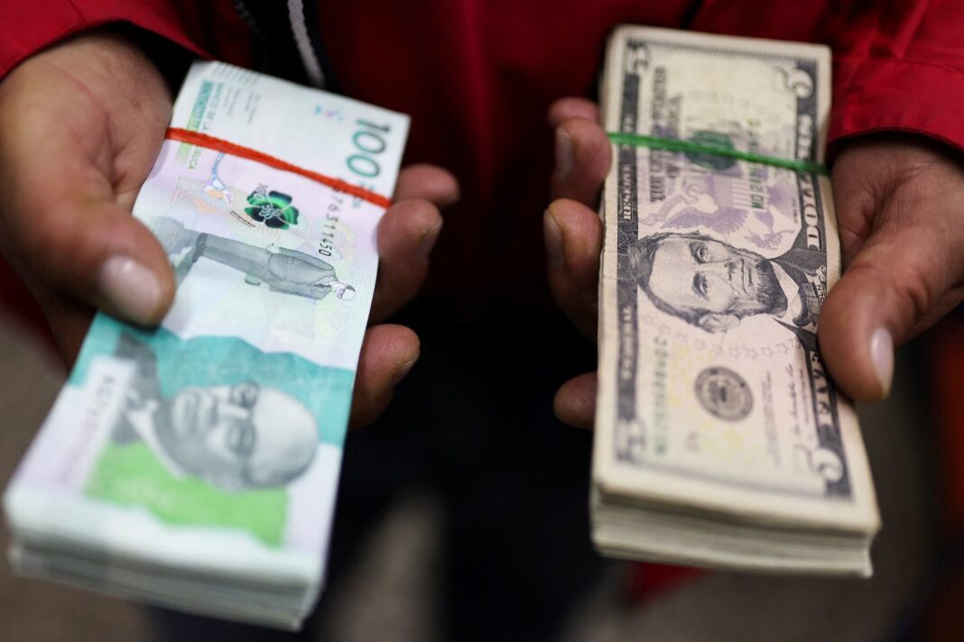 Gráfico de mercado financiero con indicadores en alza y bandera de Colombia